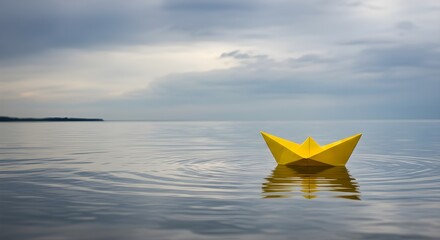 Hope Afloat Yellow Origami Boat on Calm Sea