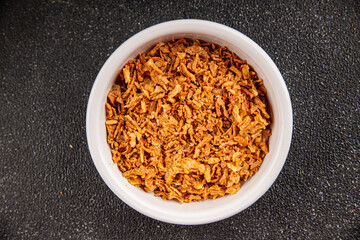 Fried onion crispy onions appetizer vegetables dish fresh delicious gourmet food background on table rustic food top view copy space vegetarian and vegan food