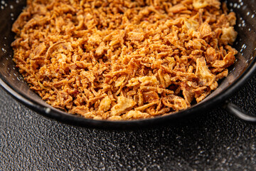 Fried onion crispy onions appetizer vegetables dish fresh delicious gourmet food background on table rustic food top view copy space vegetarian and vegan food