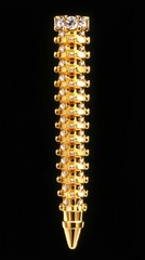 Golden pen ornate, jeweled, decorative writing implement against a black background