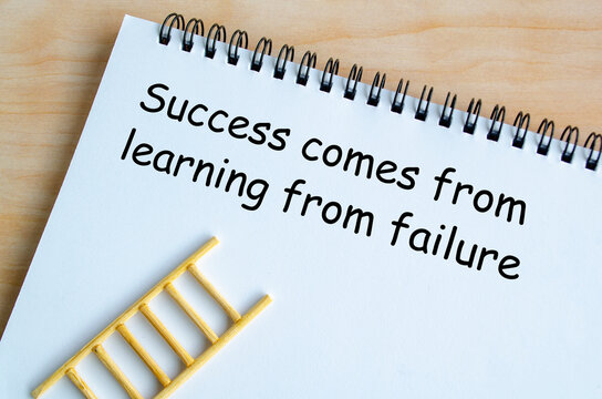 Success comes from learning from failure text on white notepad. Inspirational quote and success concept