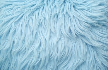 Light blue fur texture for background, plaid, textile design. Fluffy soft shaggy faux fur blanket. Pastel color palette with long fiber hair. Decorative background texture, warm home interior, modern