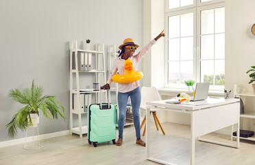 Let's go on summer vacation. Happy cheerful joyful excited African American business woman with...
