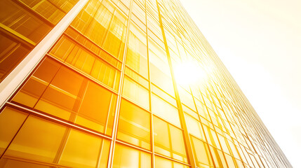 a stunning shot of a modern skyscraper bathed in golden sunlight. The building's sleek glass facade reflects the warmth of the sun