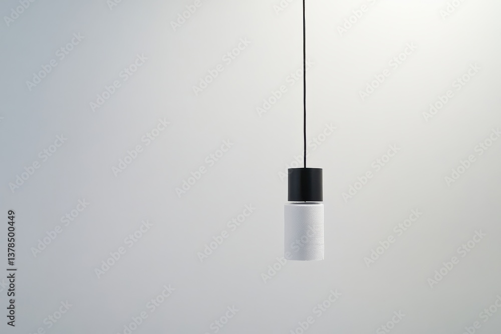 Poster minimalist pendant light hanging from ceiling in a modern interior design setting during daytime