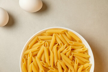 Delicious pasta ready for a culinary adventure on a textured backdrop