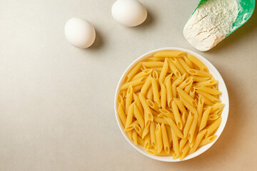 Fresh pasta ingredients laid out on a kitchen countertop ready for cooking