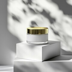 A white box and glass jar with a gold lid