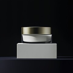 A white box and a glass jar with a gold lid