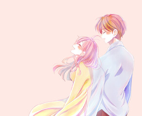 隣り合って幸せそうに笑う男女