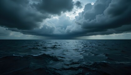 Obraz premium The roiling waves of the dark sea surface reflect the brooding clouds overhead, creating a sense of impending doom as an approaching storm looms on the horizon.