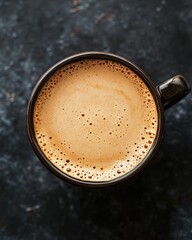 Aromatic coffee in dark mug