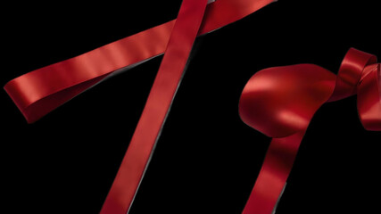 A curly red ribbon for Christmas and birthday present banner isolated against a white background.