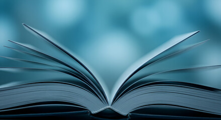 Open Book with White Pages Against Abstract Blue Background Displaying Knowledge and Education