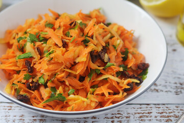A bowl with traditional Polish carrot salad  © nastyakamysheva