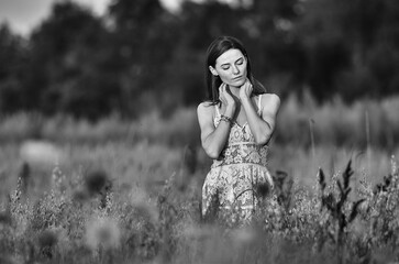young woman in a field