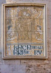 Decorative and intricate element, part of the Valencia Cathedral in Spain, showcasing religious artwork.