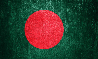 Banner of the grunge Bangladesh state flag. Dirty Bangladesh flag on a metal surface.
