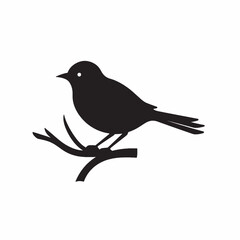 Obraz premium Black crow silhouette on a winter branch with berries