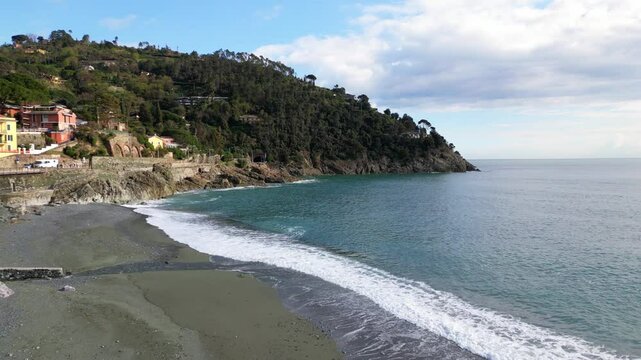 Europe, Italy, Liguria , Bonassola is a  sea village in province of Spezia in Gulf of Tigullio  , Drone  view of seafront with  pedestrian and cycle path through the tunnels from Levanto to Framura 