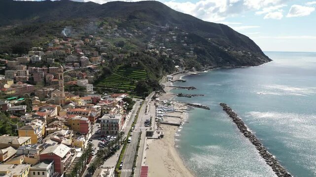 Europe, Italy , Liguria drone aerial view of Moneglia little sea village in province of Genoa close to Cinque Terre - Gulf of Tigullio Mediterranean sea landscape 