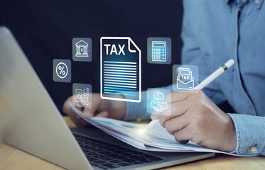 Tax and Vat concept. Government, state taxes concept. Businesman using calculator and laptop to...