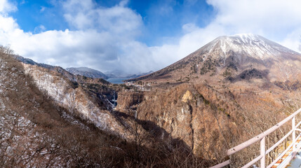 Akechidaira ropeway with surrounding beautiful viewpoints in Nikko, Japan, during cold weather in winter under cloudy blue sky