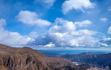 Akechidaira ropeway with surrounding beautiful viewpoints in Nikko, Japan, during cold weather in winter under cloudy blue sky