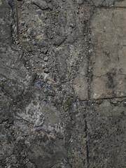 Textured Concrete Surface with Cracks, Gravel, and Weathered Appearance