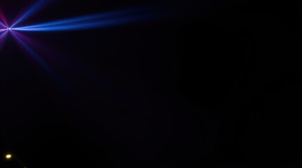 Fototapeta premium Abstract Light Beams Radiating in the Dark Night Sky Event
