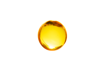 Yellow bubble oil or face serum isolated on transparent background. Beauty and skincare abstract drop of liquid for design. Drop of jojoba or argan oil.