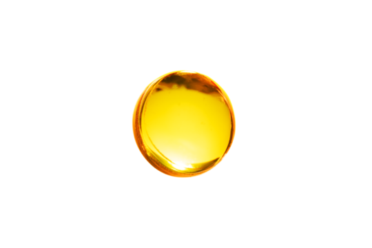 Yellow bubble oil or face serum isolated on transparent background. Beauty and skincare abstract drop of liquid for design. Drop of jojoba or argan oil.
