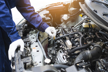Auto check, car service shop concept. Automobile repairman work checking change engine oil, lubricant to estimate repair motor machine by engineer, mechanic inspecting maintenance at vehicle garage.