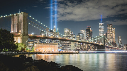Night view during 9 11 of lower Manhattan and the Brooklyn Bridge with the Tribute in Light in the...