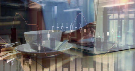 Image of statistics and data processing over woman using laptop