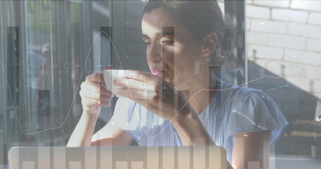 Image of statistics and data processing over woman drinking coffee and using laptop