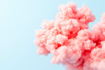 Fluffy pink cloud against soft blue sky background