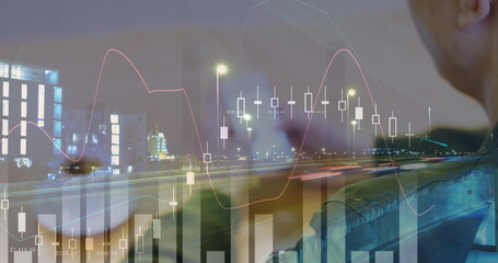 Image of statistics and data processing over cityscape and businessman using smartphone