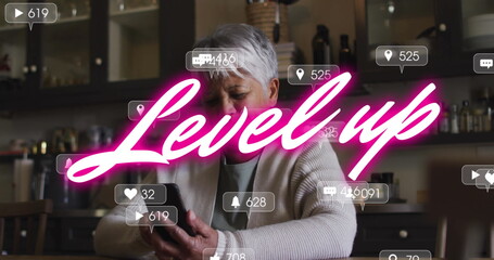 Image of pink text, level up, and social media notifications over woman in shop using smartphone