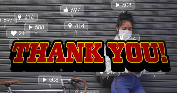 Using smartphone, woman in face mask receiving media notifications with thank you text