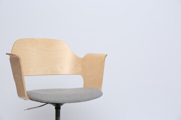 Comfortable office chair on white background, space for text