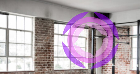 Image of purple circles spinning over industrial gym interiors