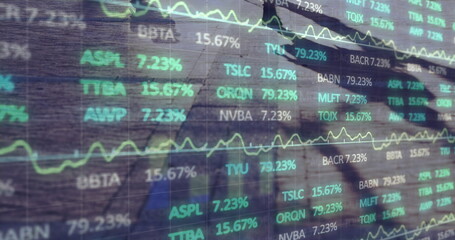 Image of financial data processing over city street