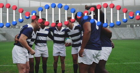 Image of dna strand over male rugby players at stadium