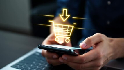 Hands use a smartphone displaying a glowing 'add to cart' icon. Visual for e-commerce apps, online shopping processes, or mobile retail concepts. Reflects digital consumer ease. 4k 60 fps.