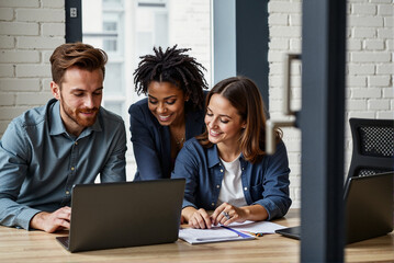 Diverse Team Collaborating in Modern Office on Creative Project