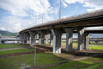 Large concrete support columns for a bridge or elevated roadway