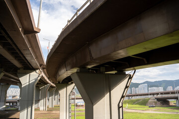 Large concrete support columns for a bridge or elevated roadway