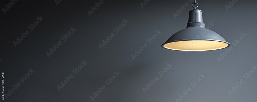 Poster a sleek and modern pendant lamp illuminates a dimly lit space, casting soft shadows and creating a c