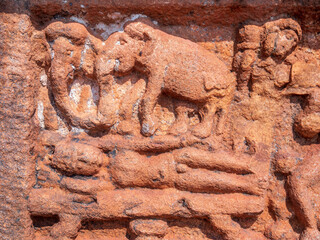 Amazing rock carving and sculptures at Badami ancient hindu temple complex, tourist destination in Karnataka, India